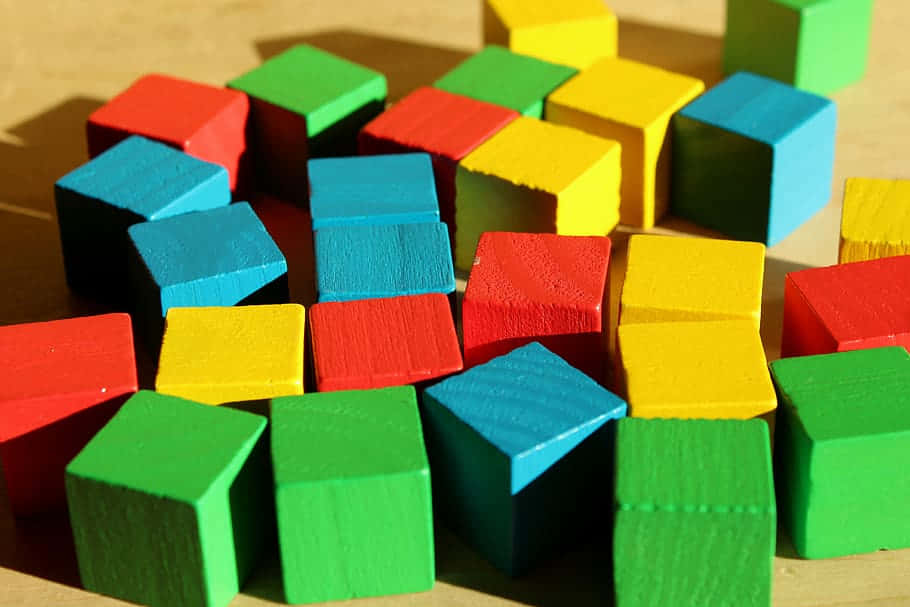 A Colorfully Assorted Collection Of Educational Toys On A White Surface Background
