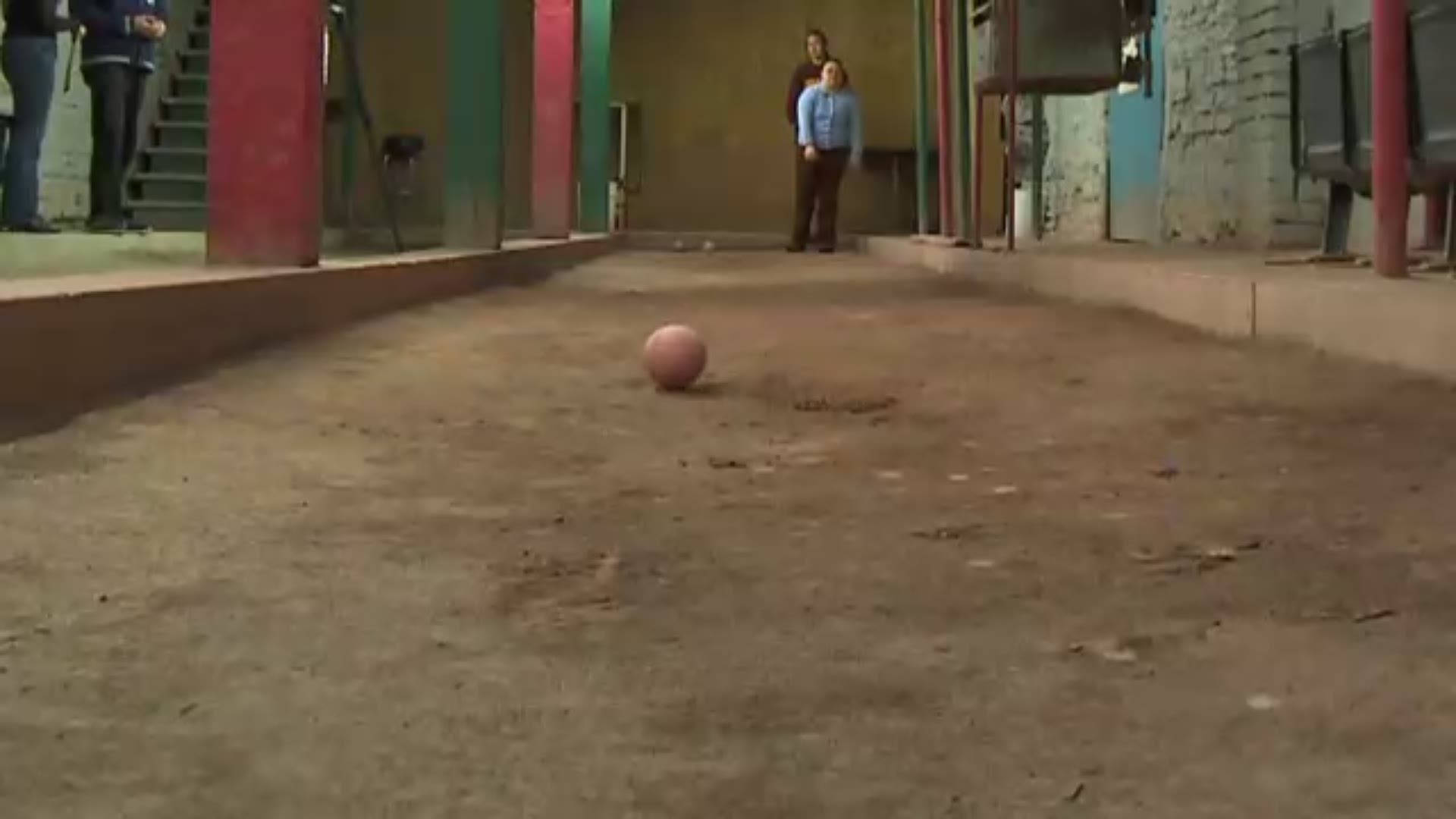 A Competitive Game Of Bocce Ball Background