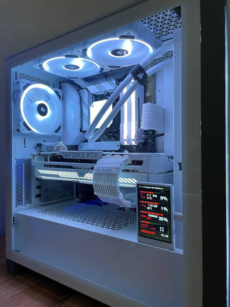 A Computer Case With A Fan And Lights Inside Background