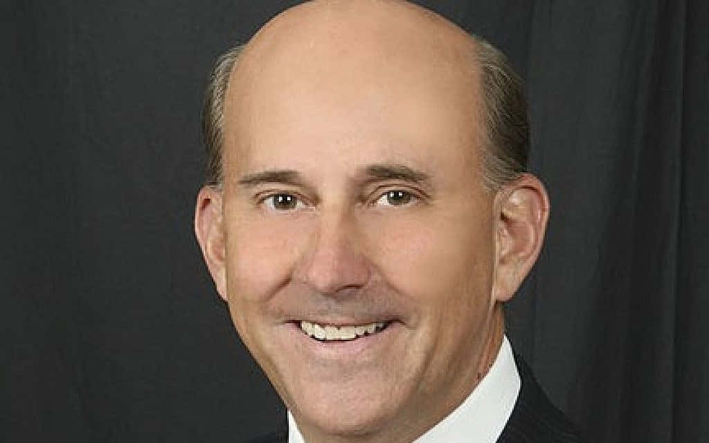 A Confident Louie Gohmert Smiling At The Camera Background