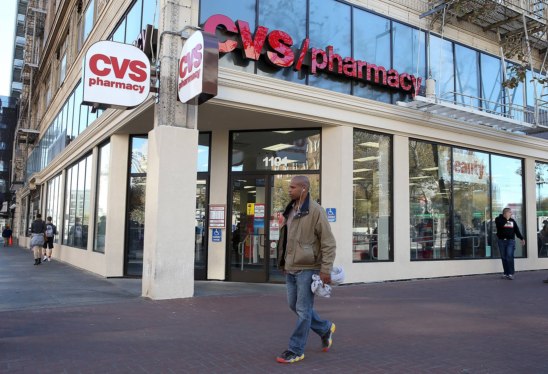 A Cool Man Outside Cvs Background