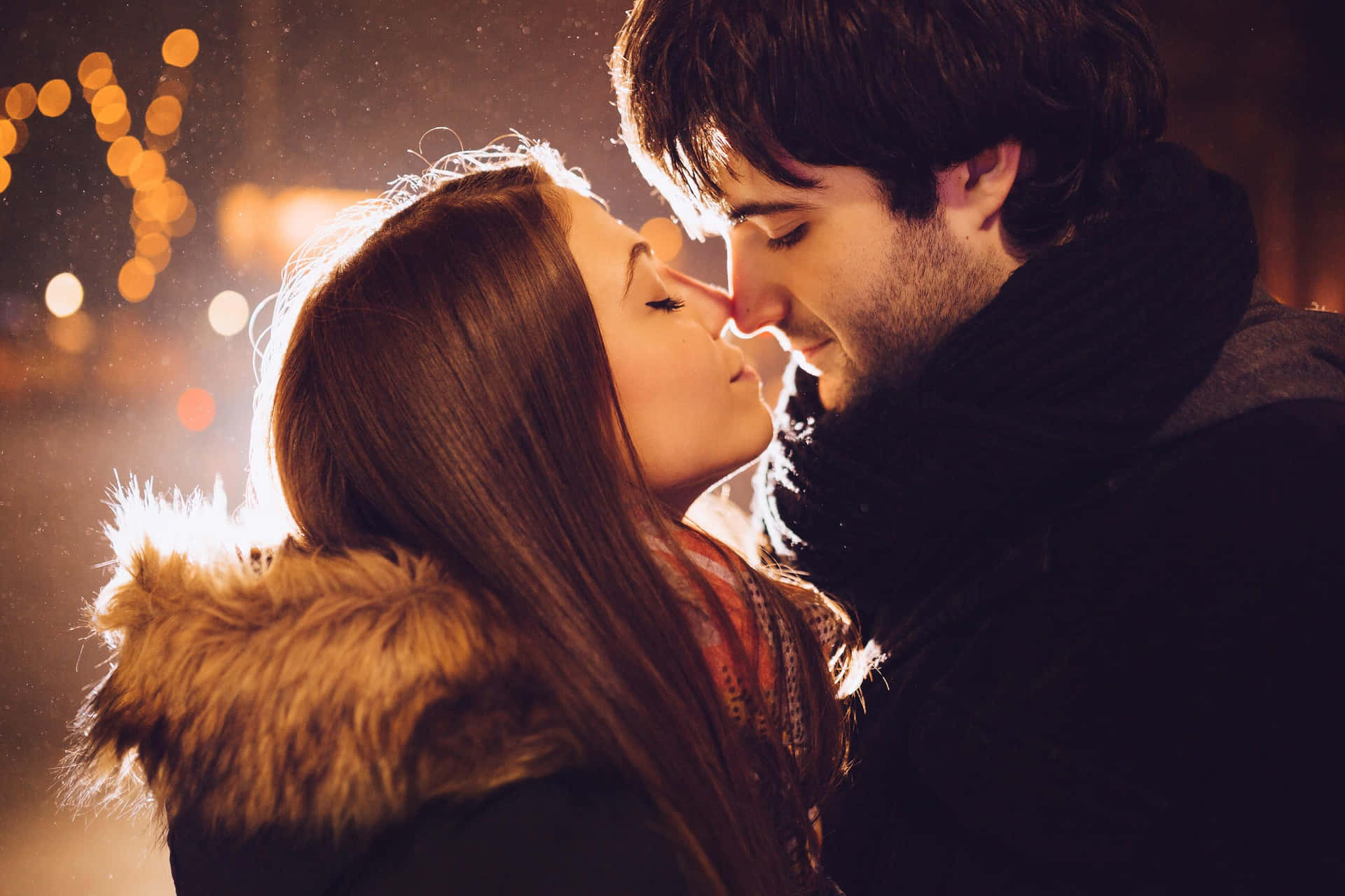 A Couple Kissing In The Snow