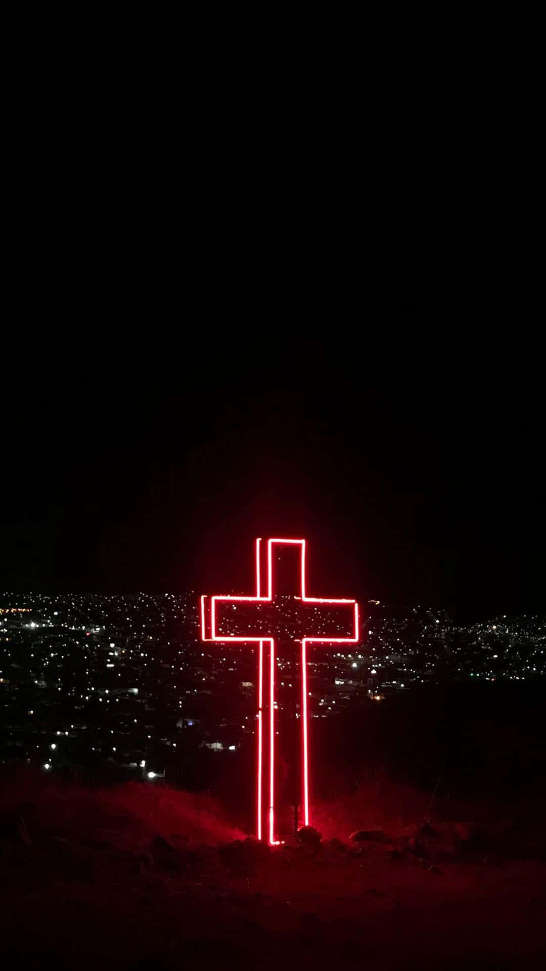 A Cross Of Worship Lit Up Aesthetically Background