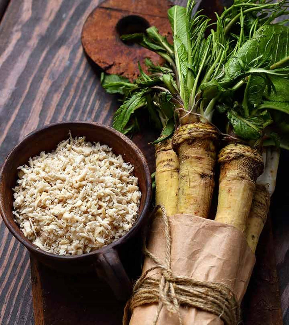 A Cup Of Fresh Crushed Horseradish Background