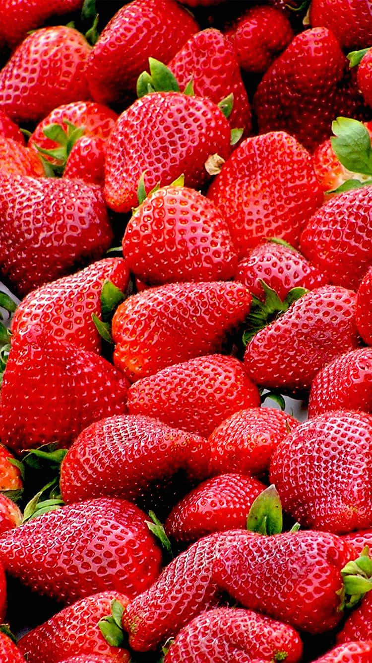 A Cute Strawberry Bursting With Sweetness! Background