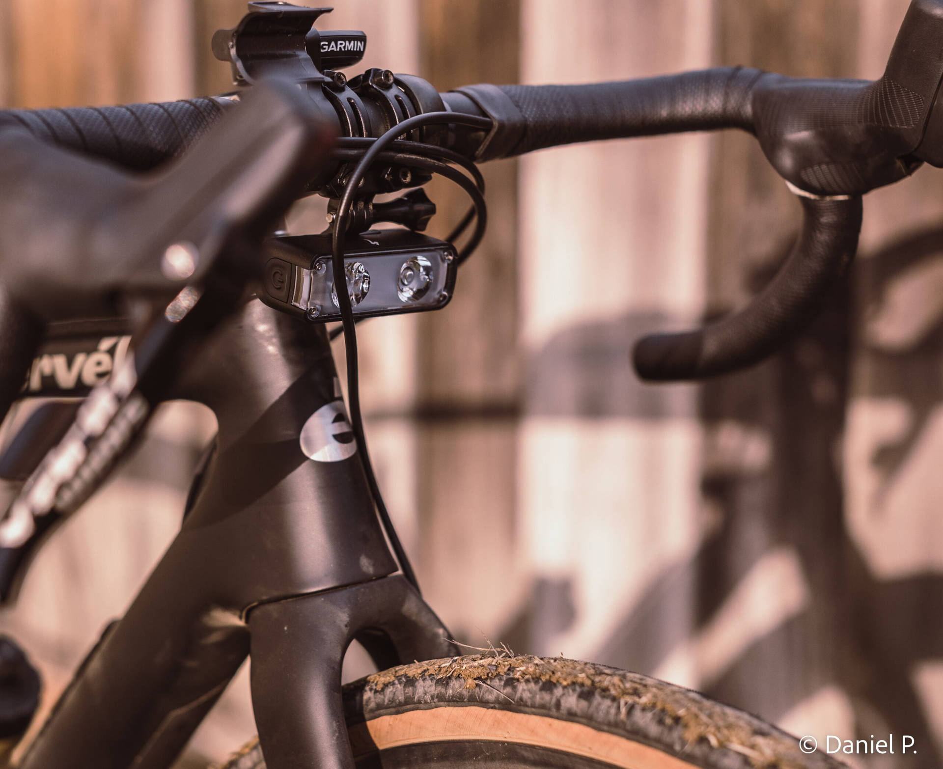 A Cyclist Riding A Specialized Bike Through A Scenic Forest Trail Background