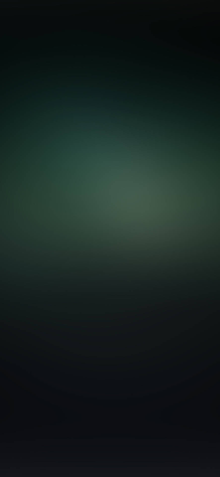 A Dark Green Background With A Blurred Background Background