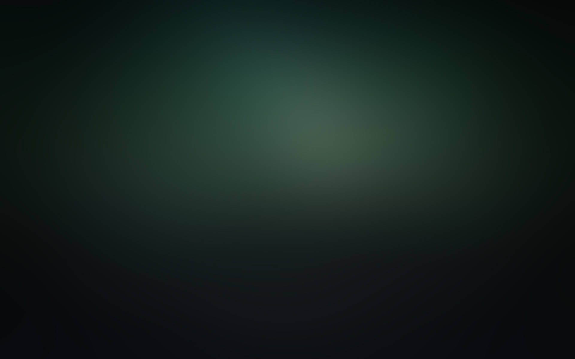 A Dark Green Background With A Blurred Background Background