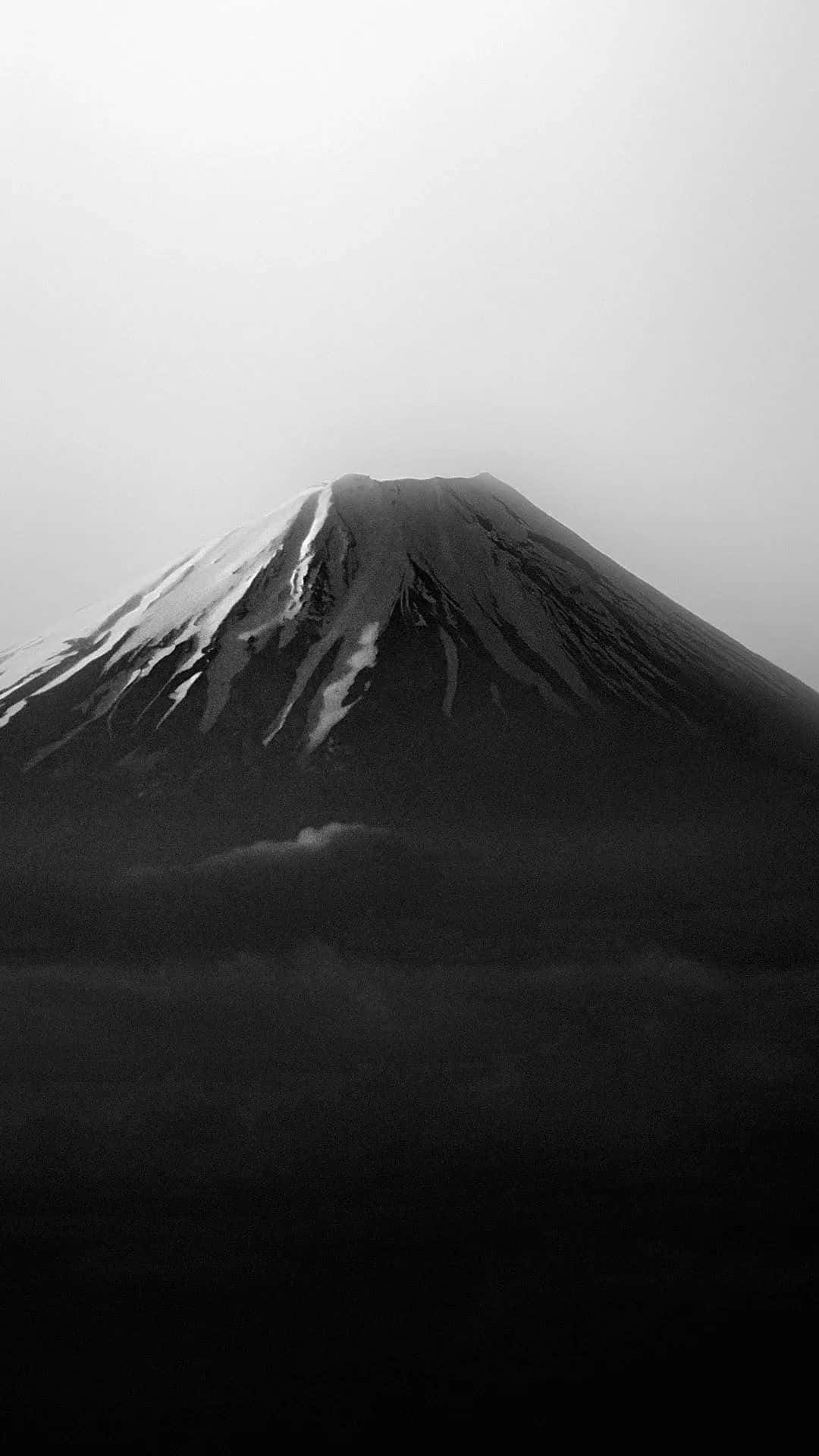 A Dark Japanese Iphone In A Geometric Pattern Background