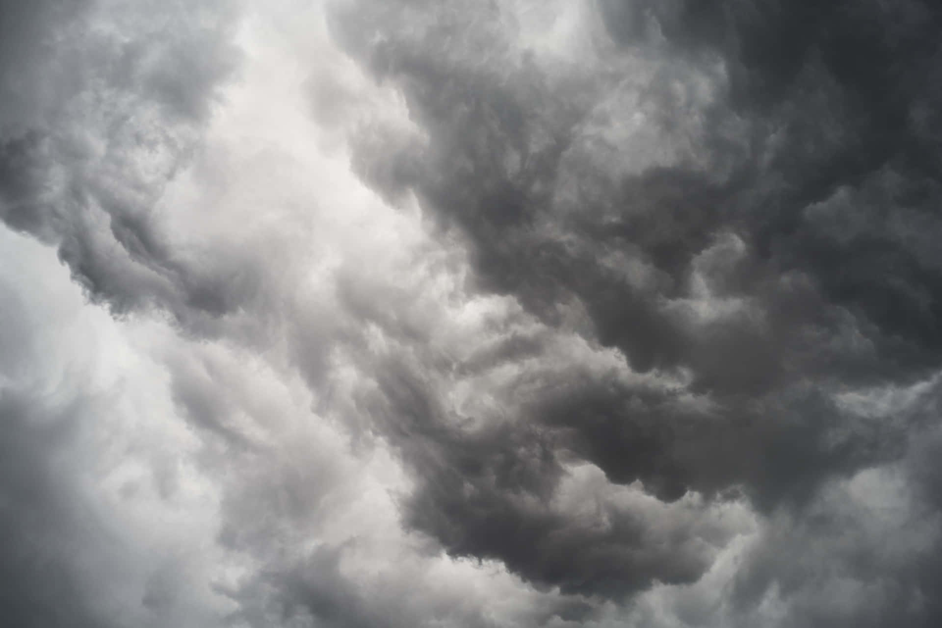 A Dark Sky In A World Of Black Clouds. Background