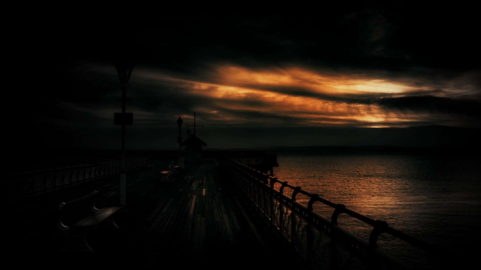 A Dark Sky Over The Water Background
