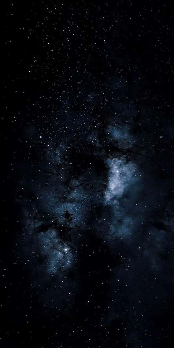 A Dark Space With Stars And Clouds Background