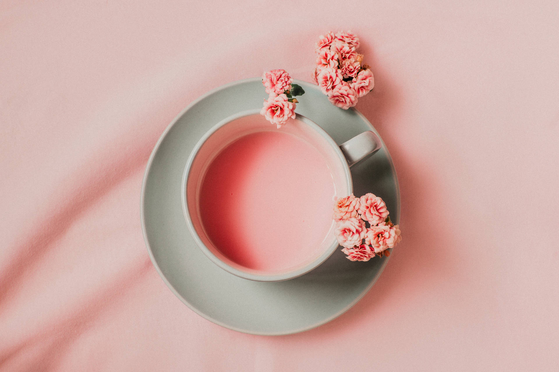 A Delicate Pastel Pink Tea Cup Background