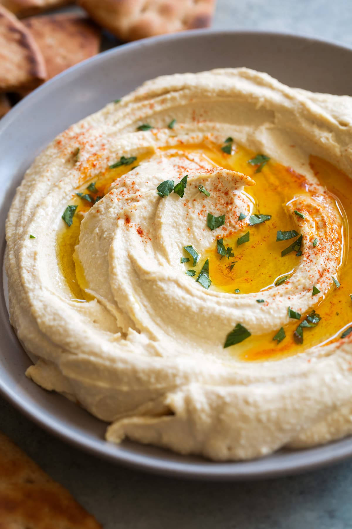 A Delicious Bowl Of Creamy Hummus Drizzled With Olive Oil