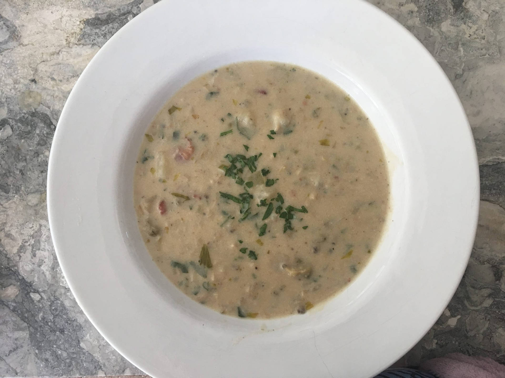 A Delicious Bowl Of New England Clam Chowder Background