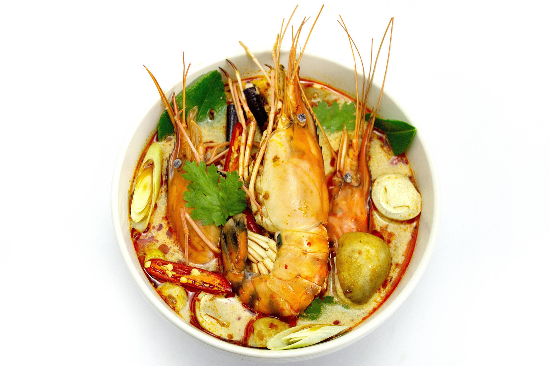 A Delicious Bowl Of Tom Yum Soup With Big Prawns Background