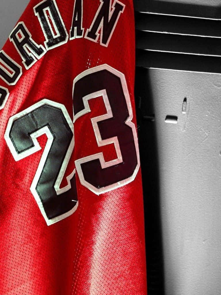 A Detailed Image Of Michael Jordan's Iconic #23 White Jersey Background