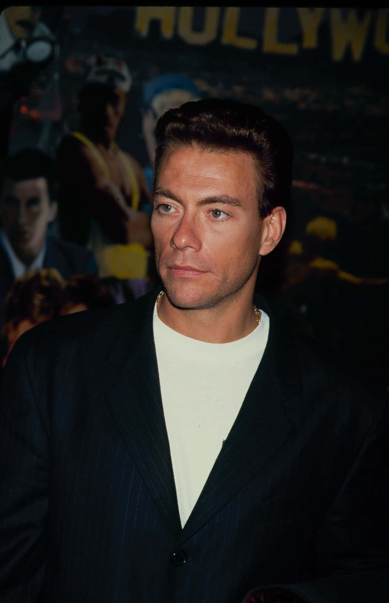 A Determined Jean Claude Van Damme In A Striking Pose. Background