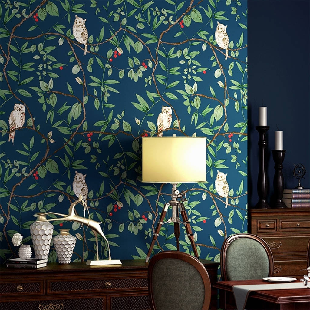 A Dining Room With A Blue Wallpaper And A Table Background