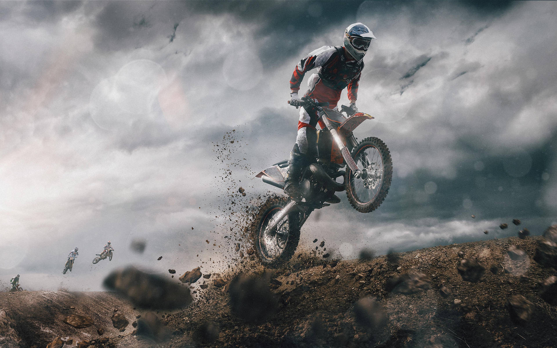 A Dirt Bike Rider Is Jumping Over A Dirt Field Background