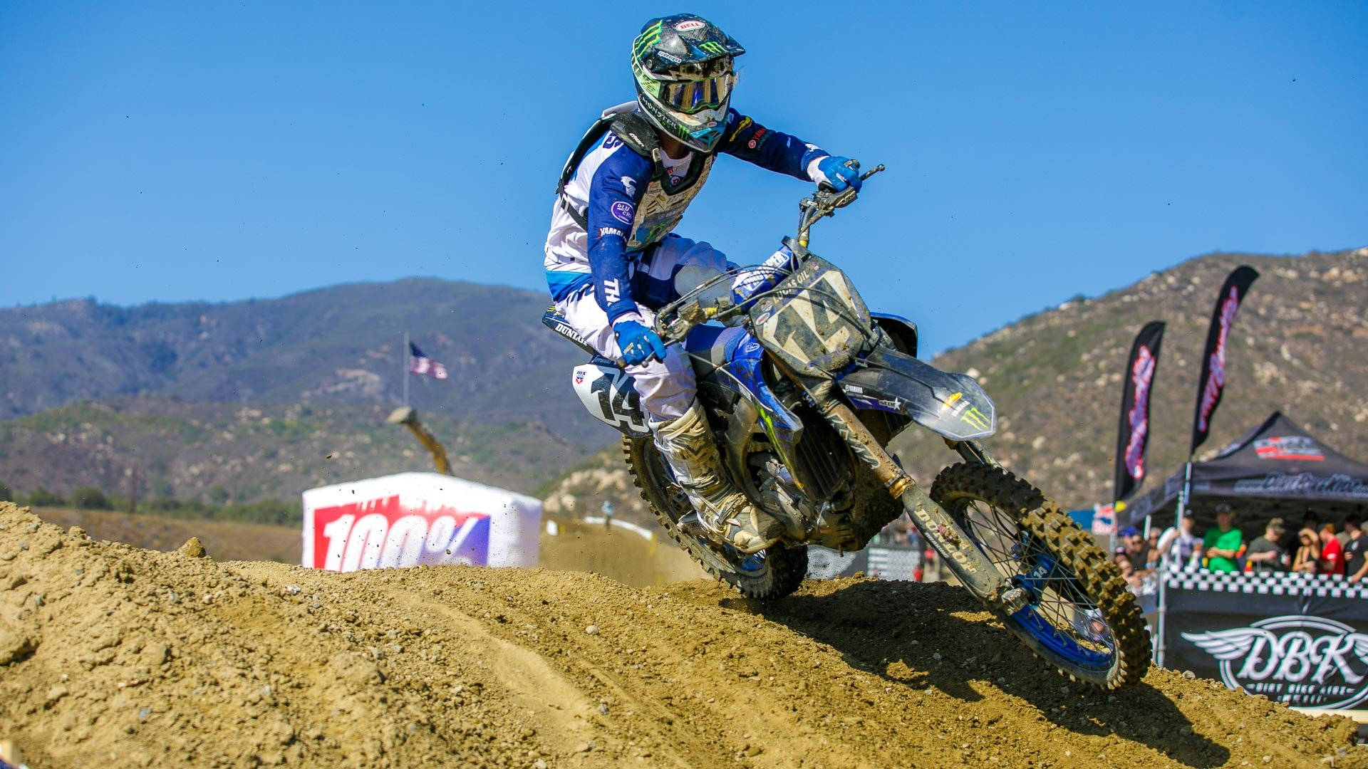 A Dirt Bike Rider On A Dirt Track