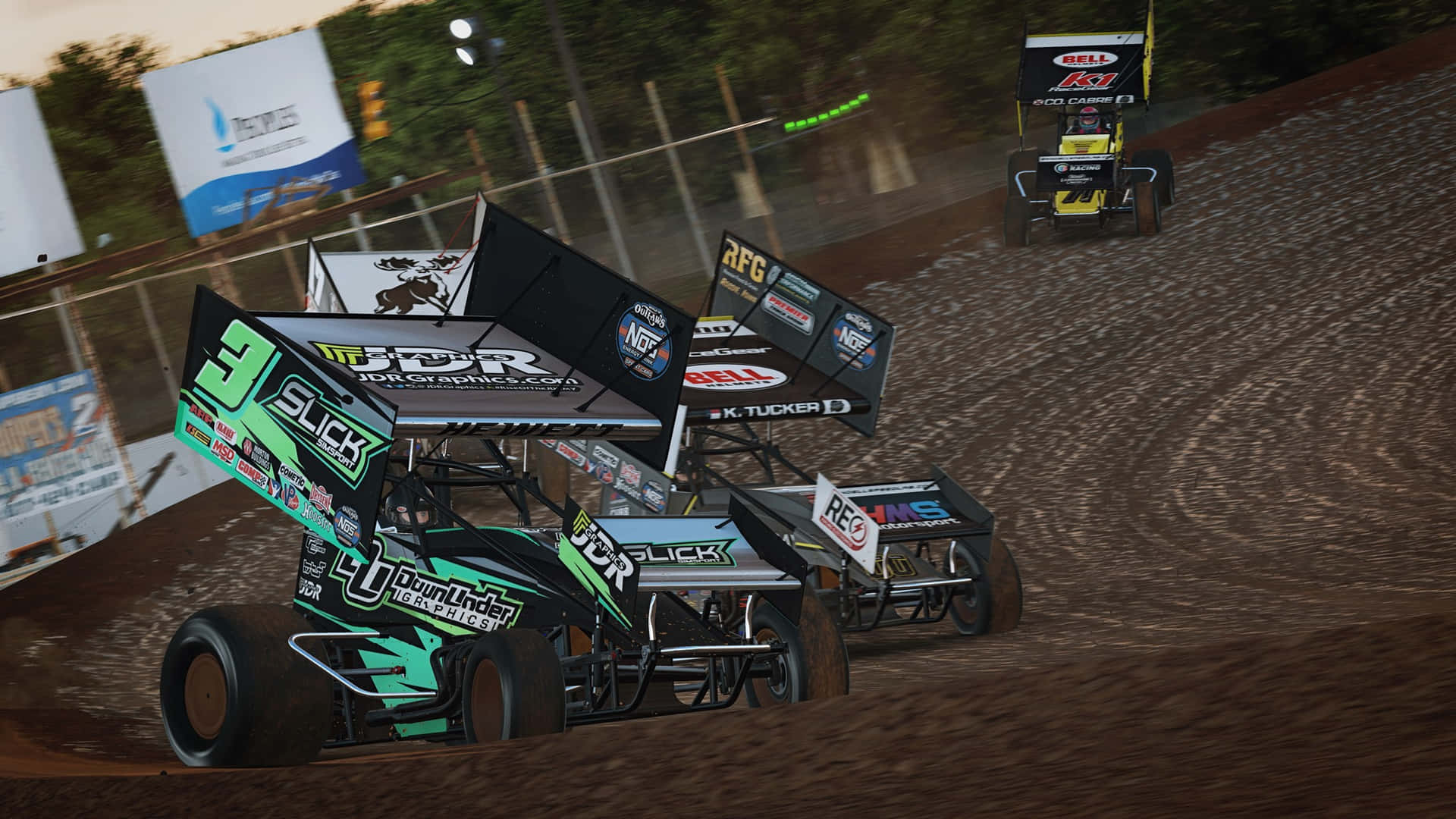 A Dirt Track With Dirt Cars Racing Down The Track Background