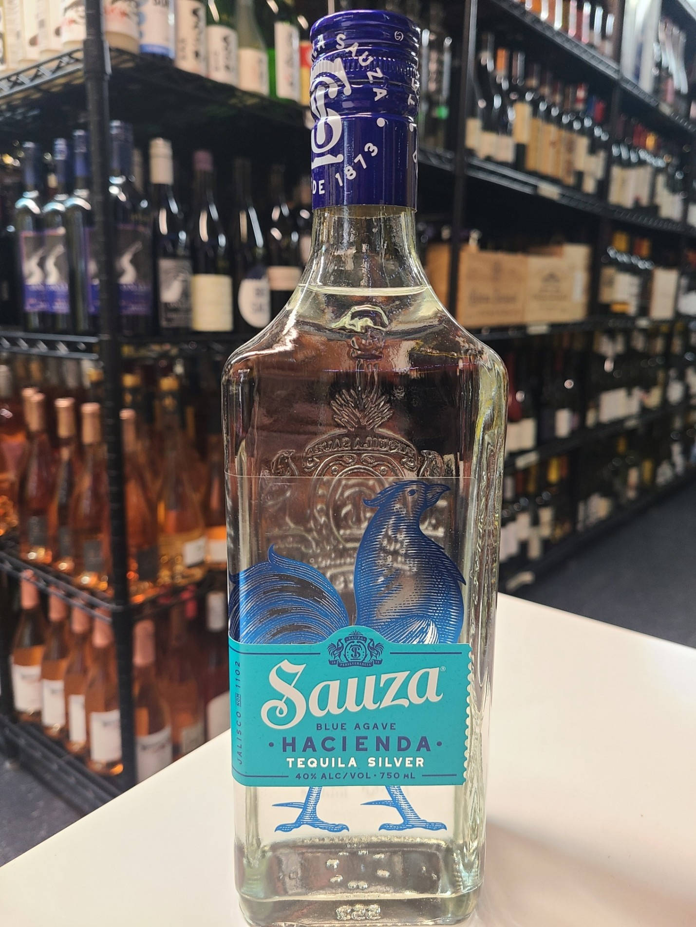 A Distinct Bottle Of Sauza Silver Tequila On Display In A Liquor Store Background