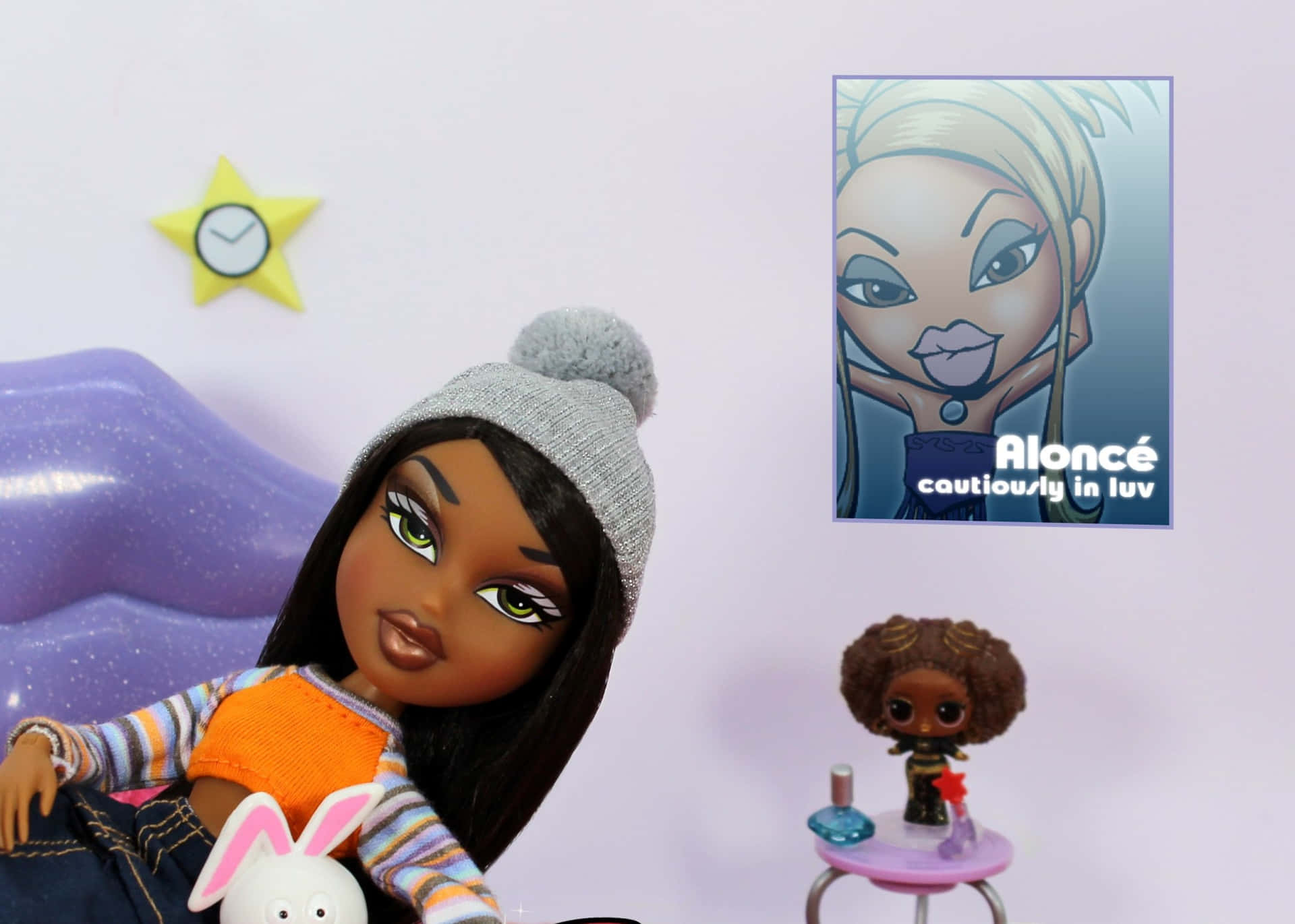 A Doll Is Sitting On A Bed With A Picture Of A Doll