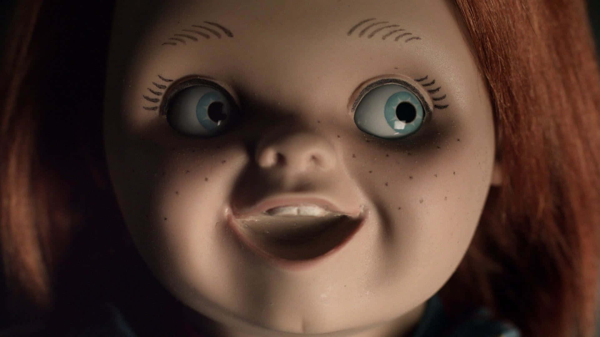 A Doll With Big Eyes And Red Hair Background