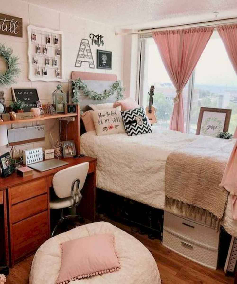 A Dorm Room With Pink And White Decor