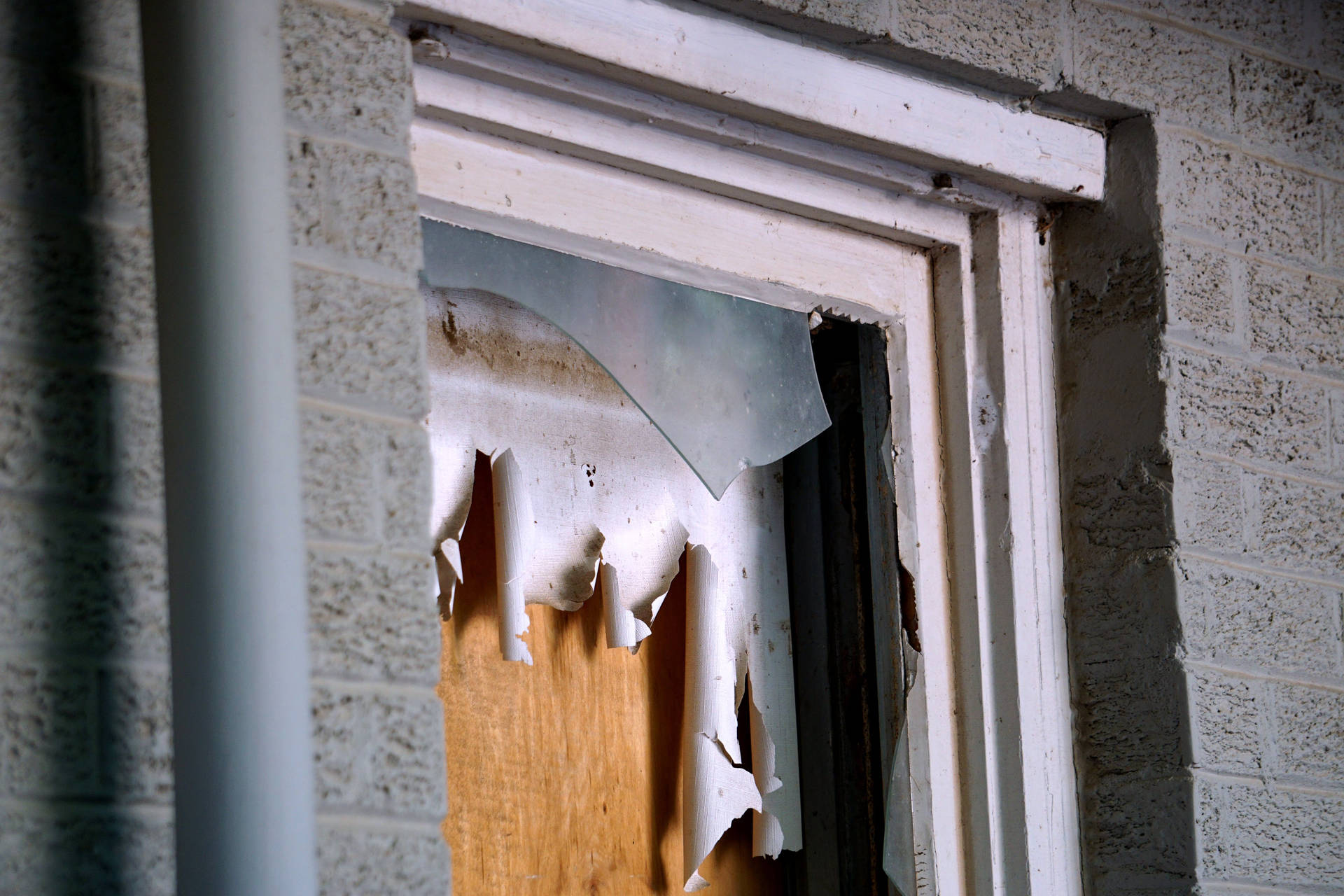A Dramatic Display Of Sharp Shards On Broken Window