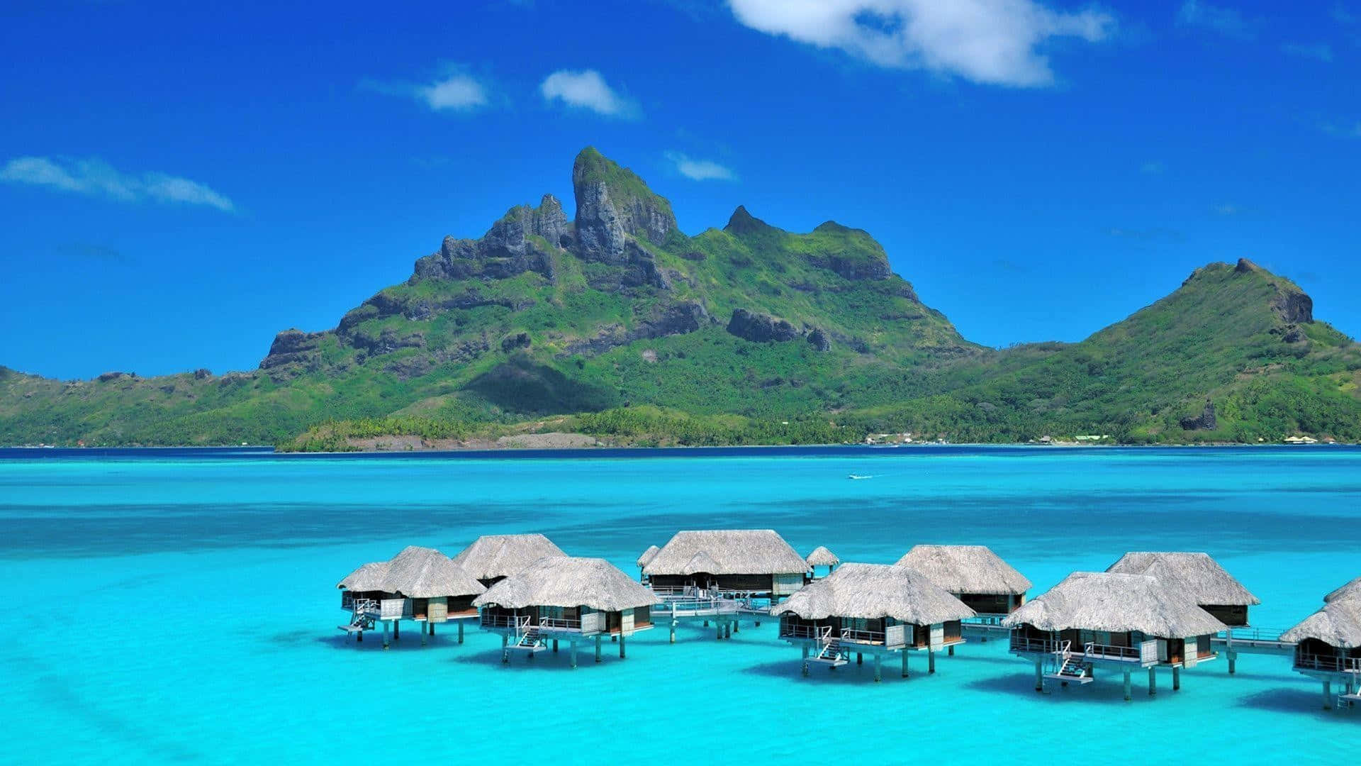 A Dreamy Sunrise In Bora Bora Background