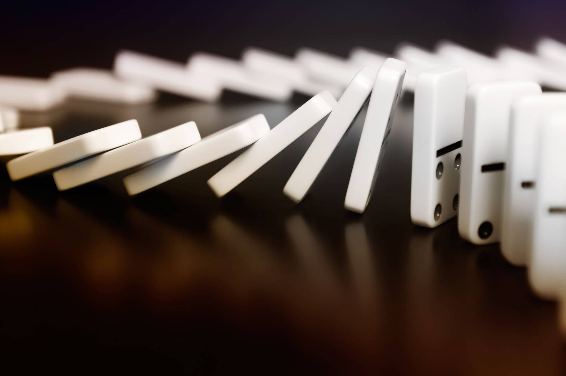 A Dynamic Display Of Falling Dominoes