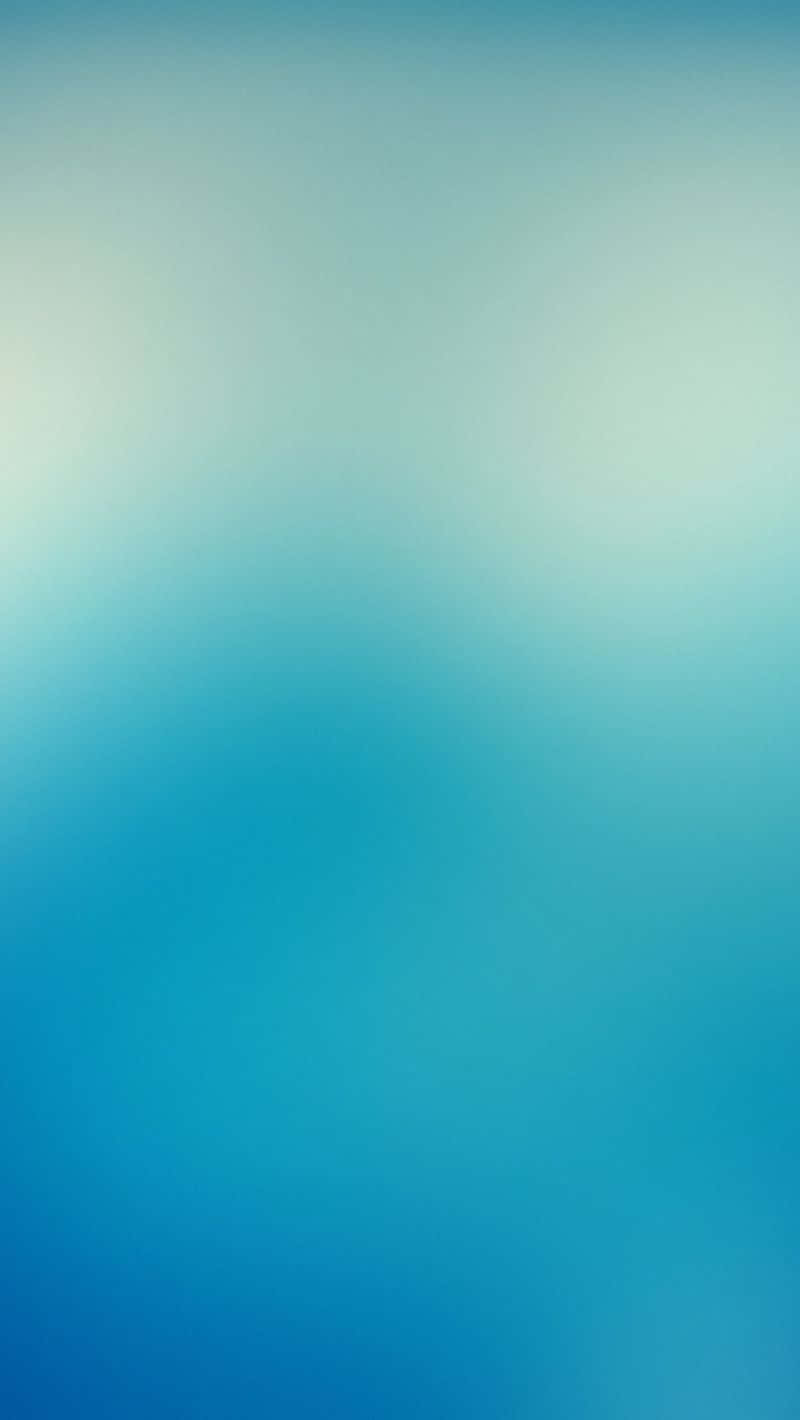 A Faded Beach Scene Along The Crystal Clear Water Of A Caribbean Paradise Background