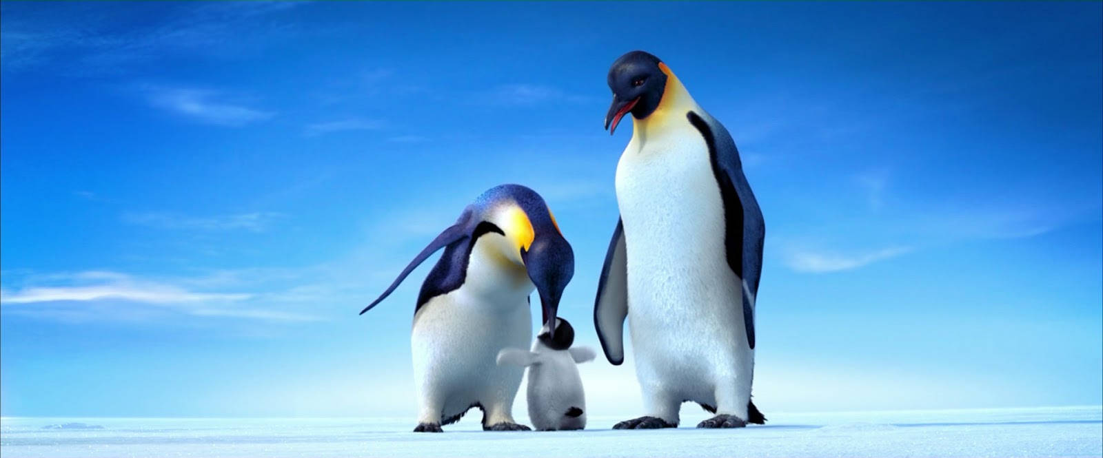 A Family Of Penguins Standing On The Snow Background