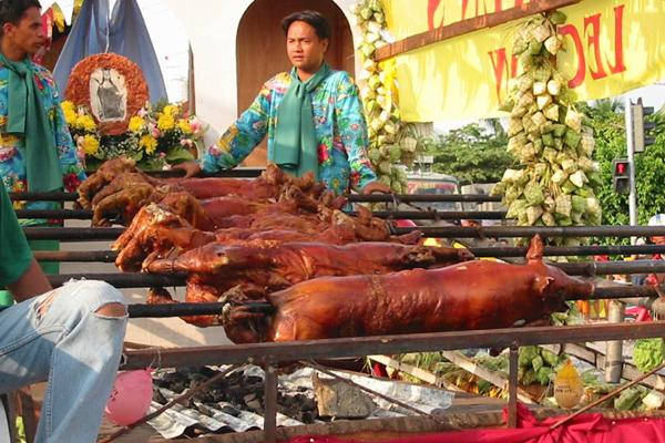 A Festive Feast At The Lechon Festival In The Philippines.