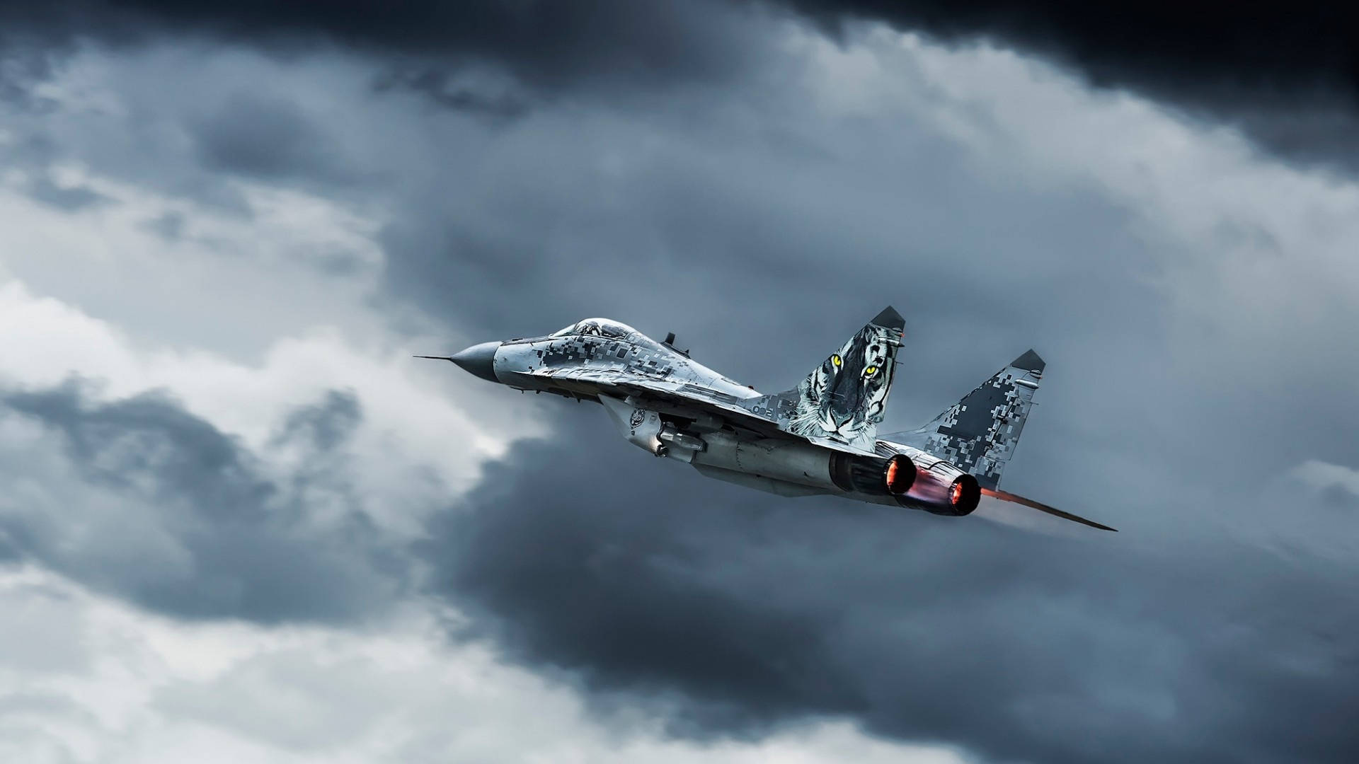 A Fighter Jet Flying Through A Cloudy Sky Background