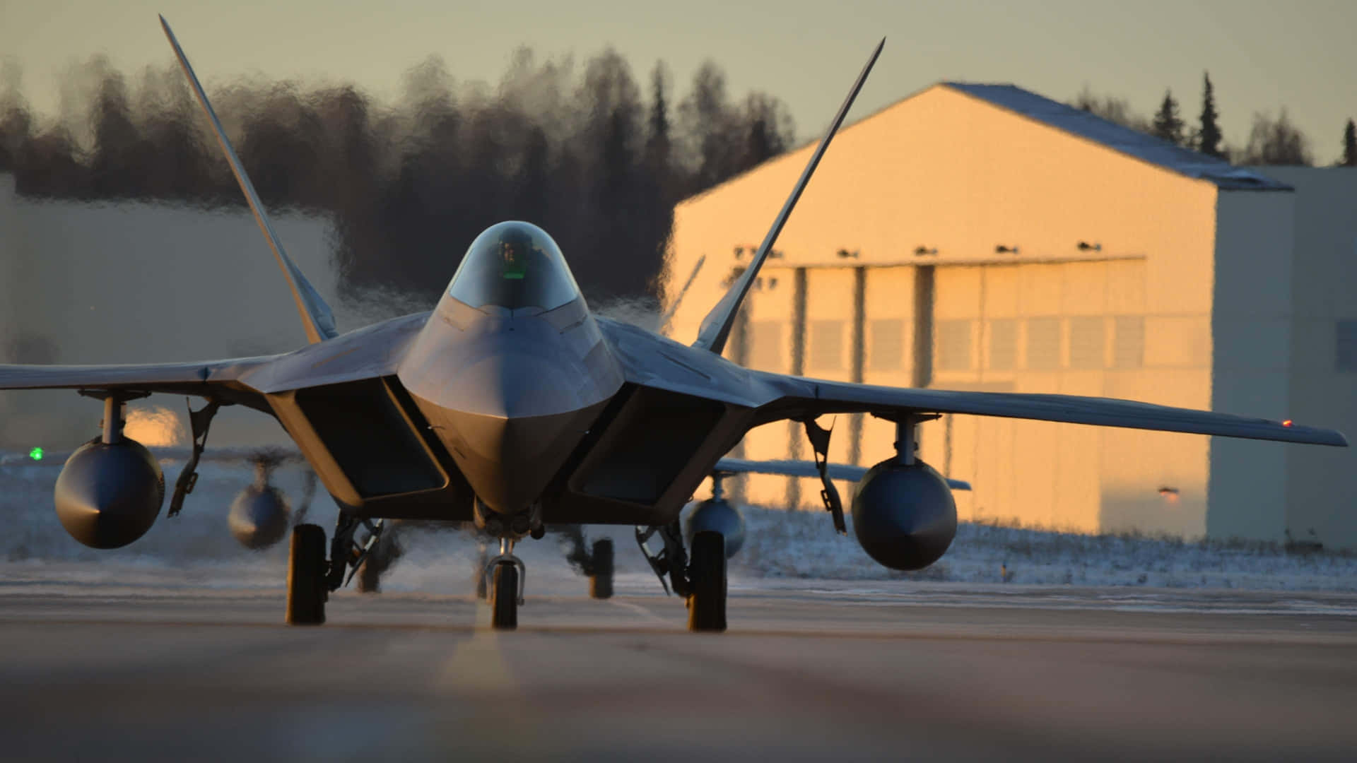 A Fighter Jet Is On The Runway Of A Building Background