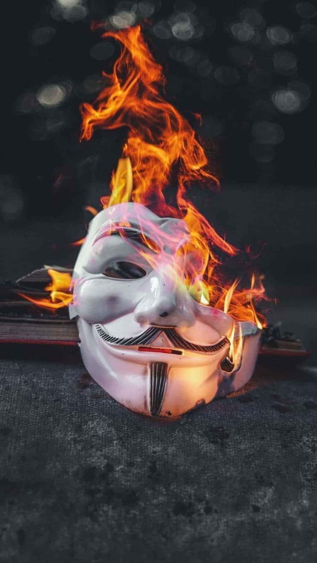 A Fire Burning A Mask Of V For Vendetta