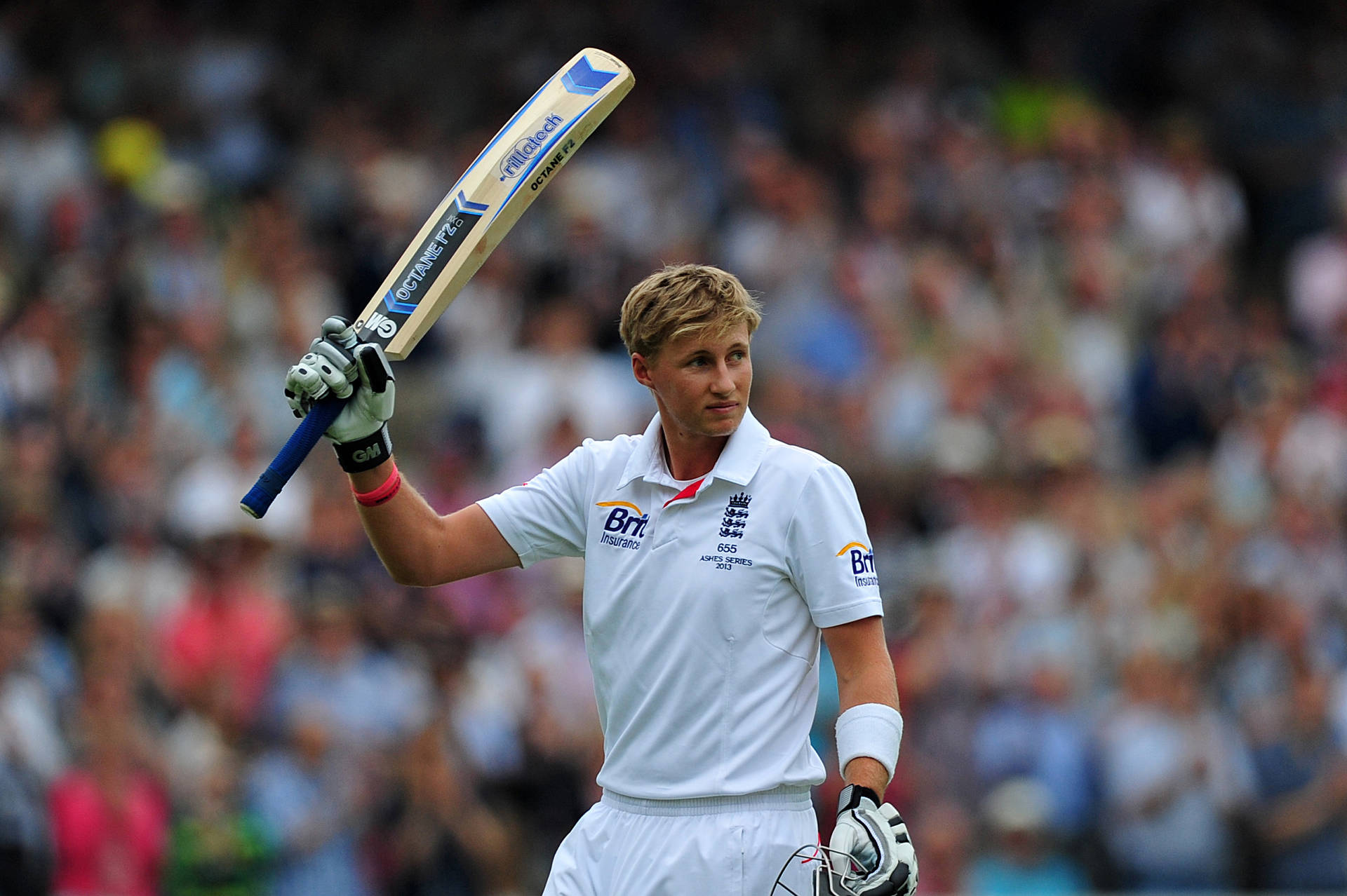 A Focused Joe Root During A Cricket Match Background