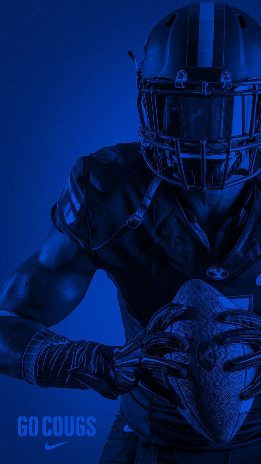 A Football Player Holding A Ball Background