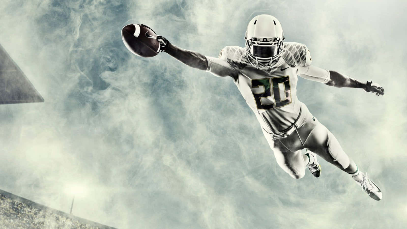 A Football Player In The Air Background