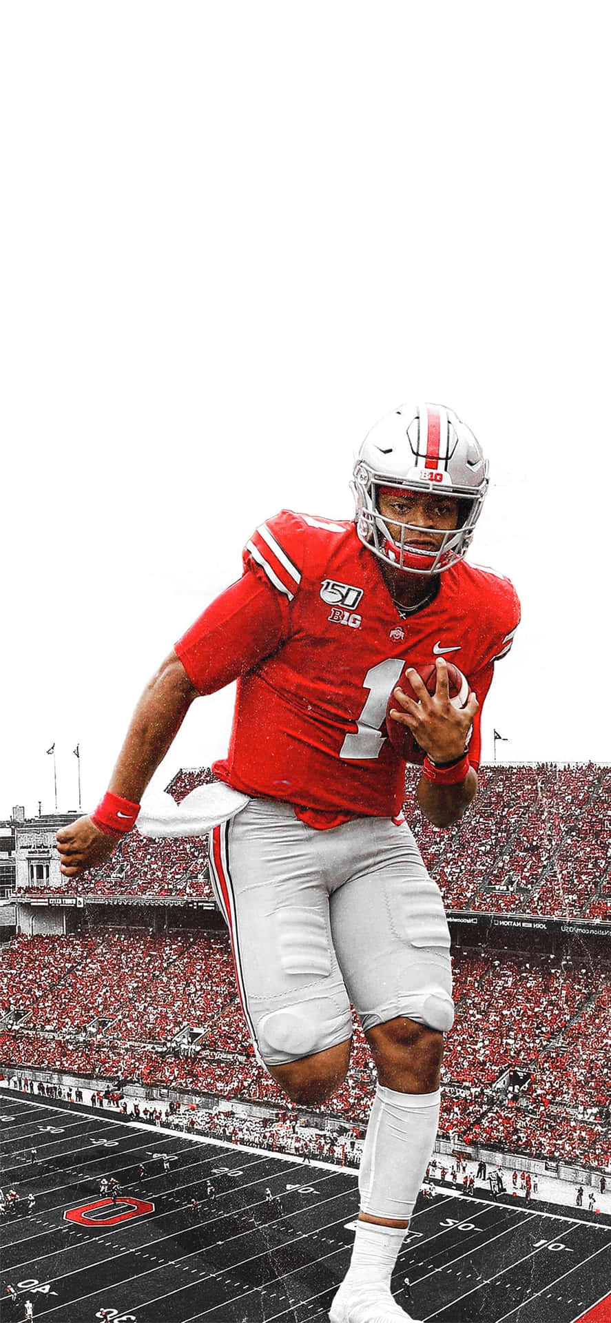 A Football Player Running On A Field