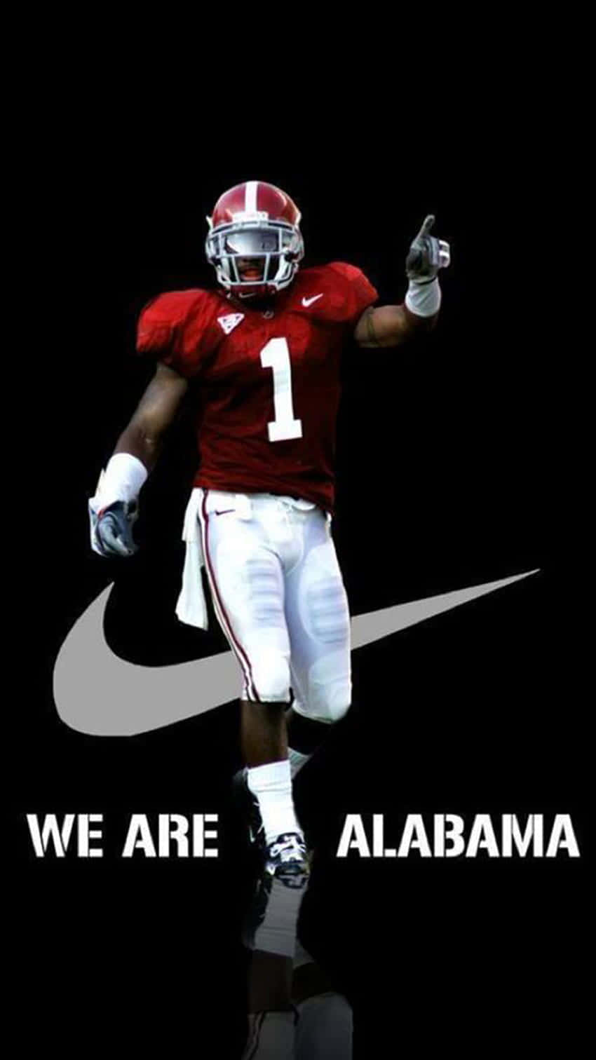 A Football Player With The Words We Are Alabama Background