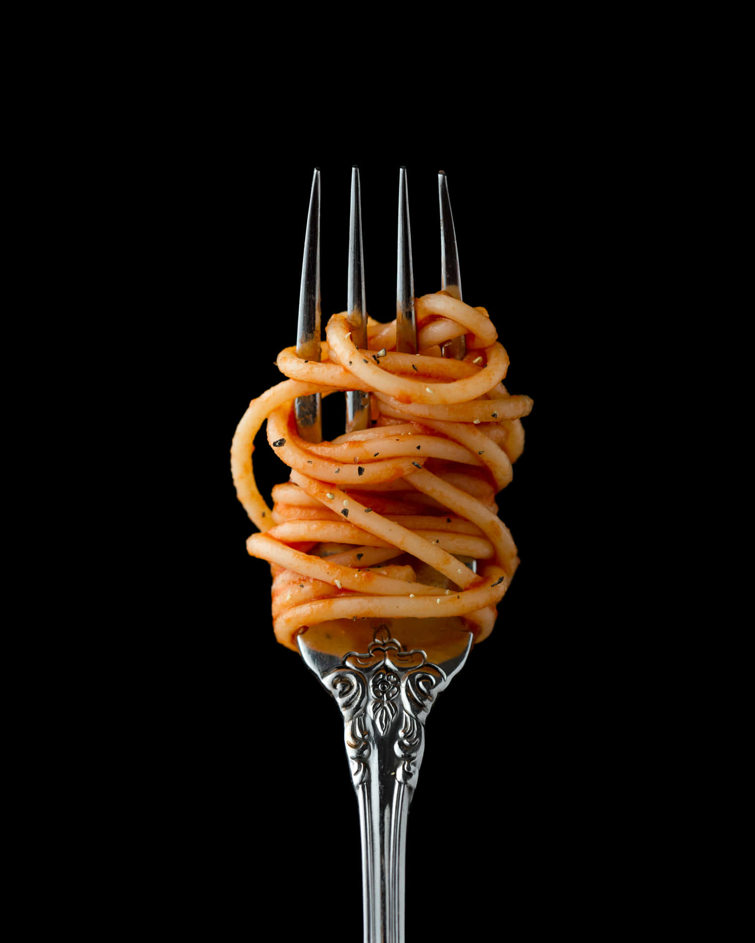 A Fork With Spaghetti On It Background