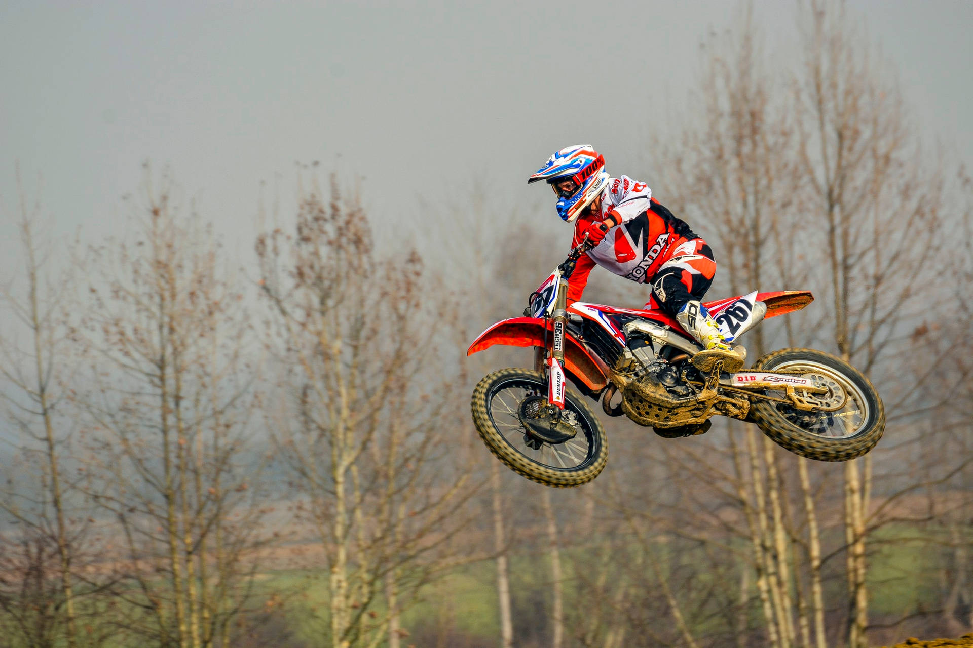 A Fox Dirt Bike Gearing Up For Excitement Background