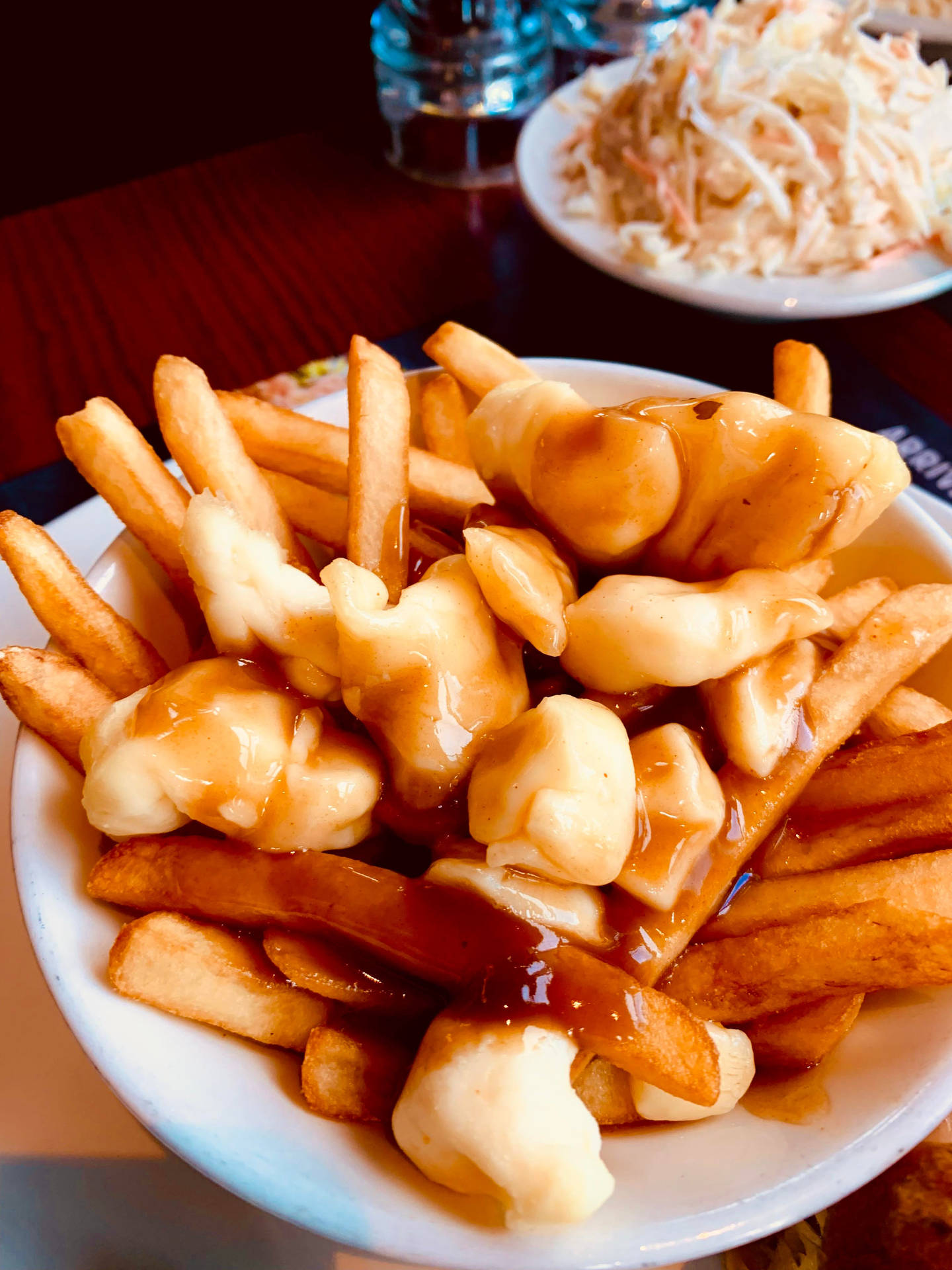 A Fresh Serving Of Authentic Canadian Poutine Background