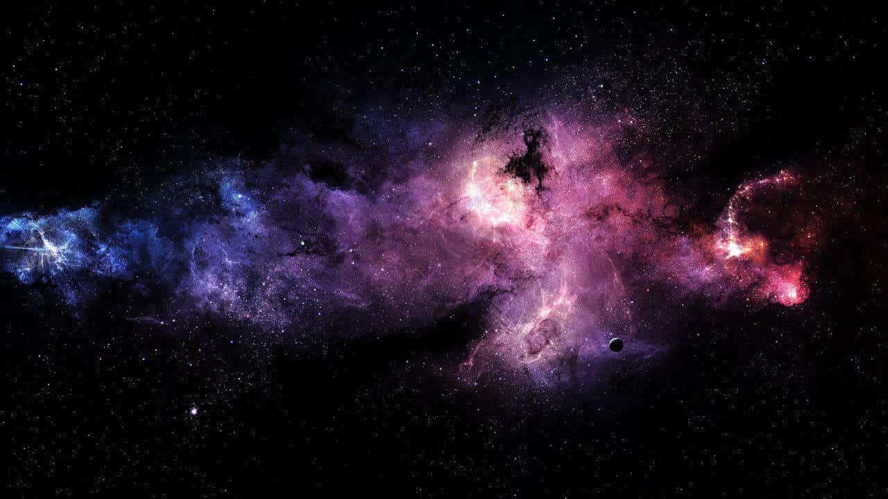 A Galaxy With Stars And Nebulas Background