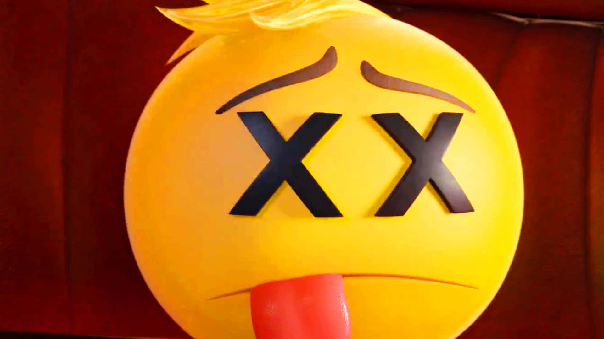 A Giant Emoji Expressing Sadness From The Emoji Movie