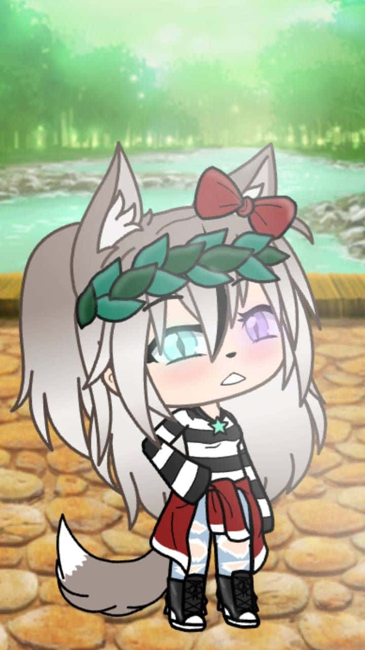 A Girl In A Striped Outfit Standing In A Wooded Area Background